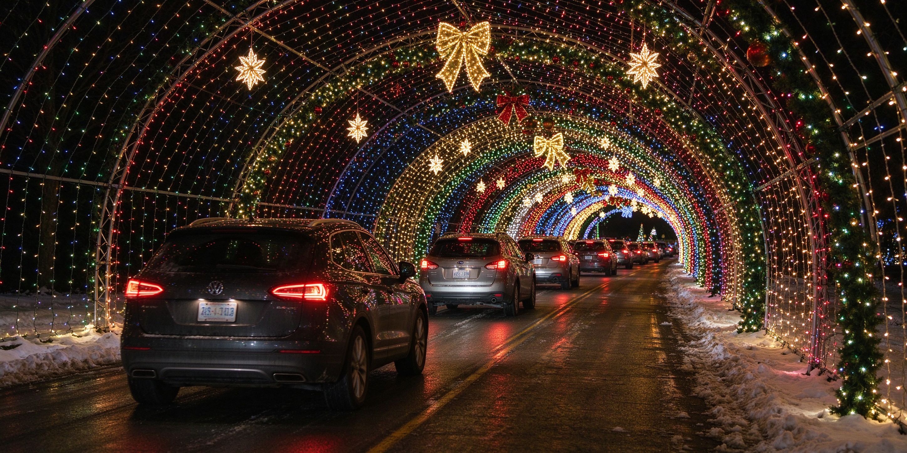 Drive through christmas lights tunnel with holiday lights display